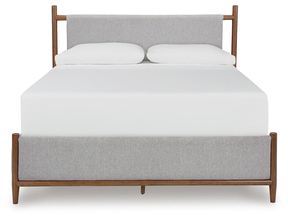 Lyncott Queen Upholstered Bed with Mirrored Dresser